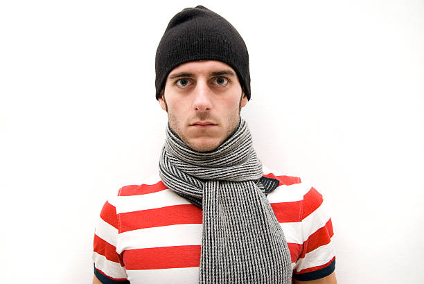 istock man with the cap and scarf 95711240