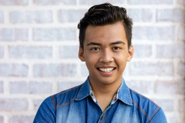 istock Happy Young Asian Man 957121810