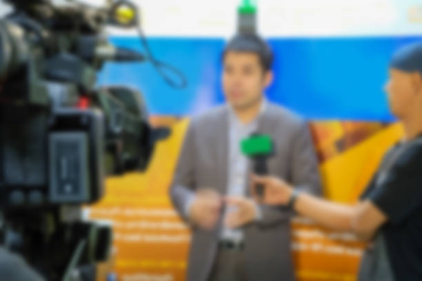 istock Motion blur of journalist interview an analyst 957124642