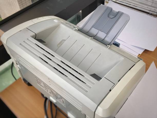 istock close up small desktop inkjet printer on desk 957125468