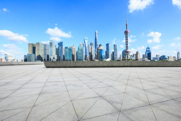 istock empty square floor and modern city architecture in shanghai 957125864
