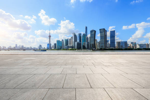 istock empty square floor and modern city architecture in shanghai 957125992