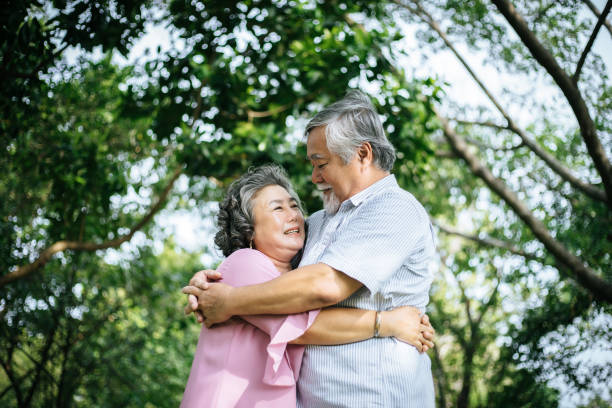 istock Happy senior couple in the park 957126232