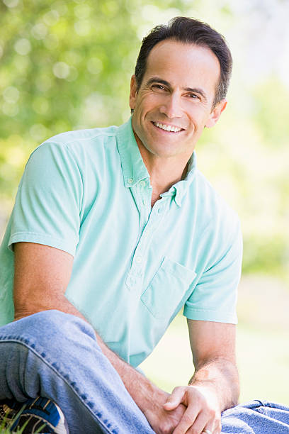 istock Man sitting outdoors 95712971