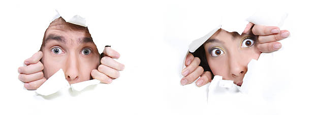 istock Man and woman ripping through wall 95713075