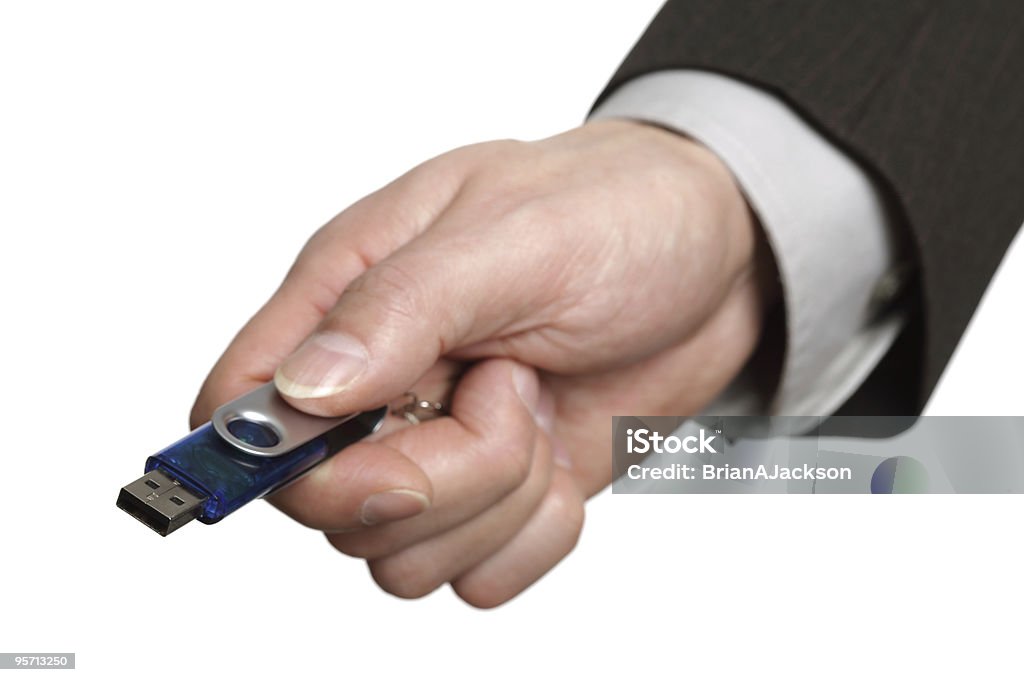 Clé USB à mémoire flash en main - Photo de Clé USB de mémoire flash libre de droits