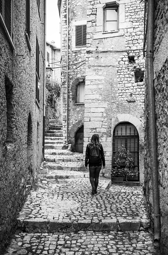 Sermoneta, Italy - 15 April 2018 - A very little and awesome medieval hill town in province of Latina, Lazio region, all in stone with famous Caetani old palace. Here in particular an alley in stone