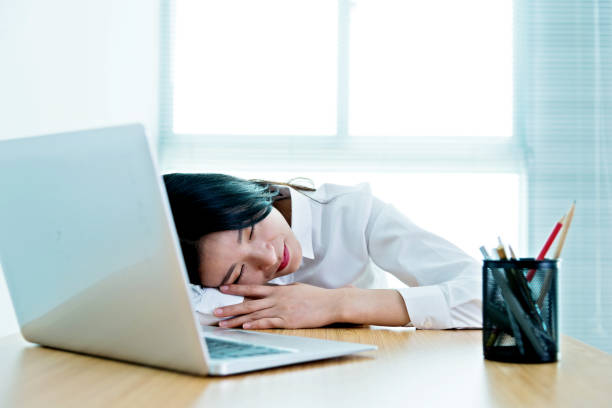 istock Businesswoman napping on desk 957134548