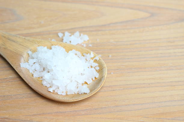 istock Sea salt on wooden ladle 957141366