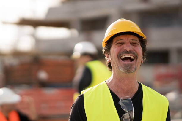 istock Laughing civil engineer at work, portrait 957144088