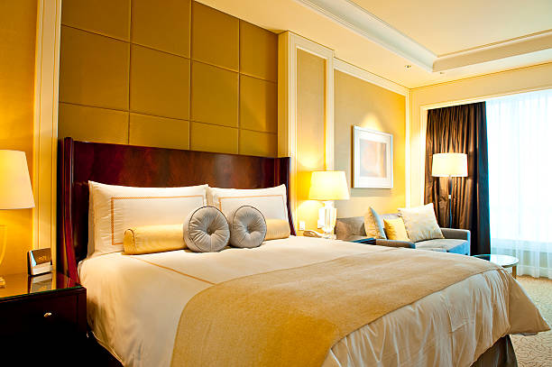 istock A nice yellow hotel room with one bed 95714603