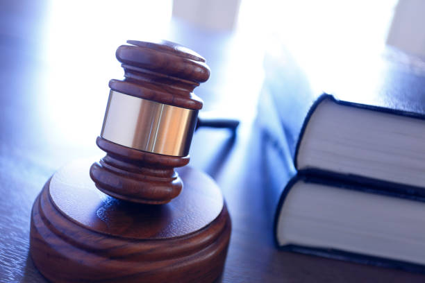 istock Gavel In Front Of An Open Law Book 957150324