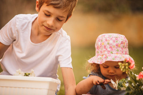 istock Children gardening 957153980