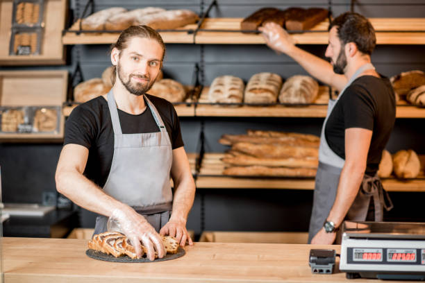 istock Bread sellers at the bakery shop 957155088
