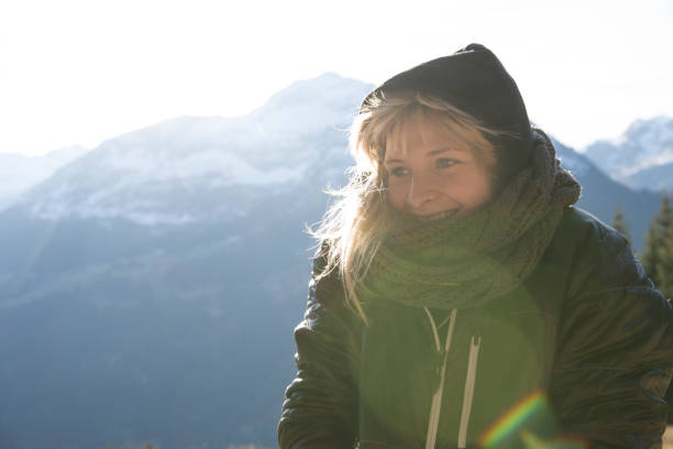 Young woman walks in mountain meadow Mountains in distance, Grindelwald, Bern Canton Grindlewald stock pictures, royalty-free photos & images