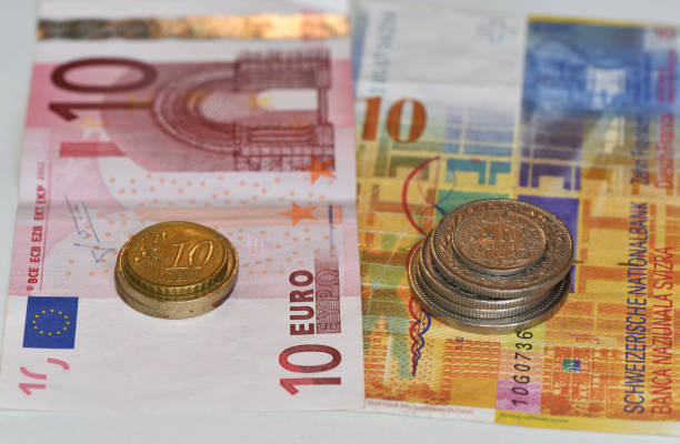 Euro coins and banknotes on background