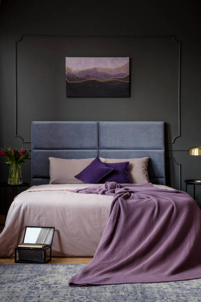 istock Purple dark bedroom interior 957163032