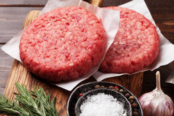 istock Tasty home made burgers cooking 957163772