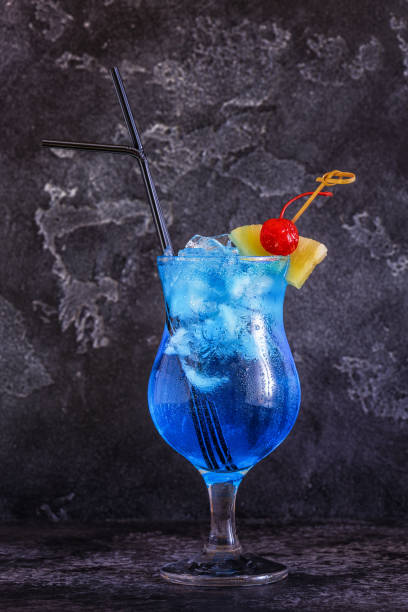 istock Blue Curacao cocktail decorated with fruit 957164356