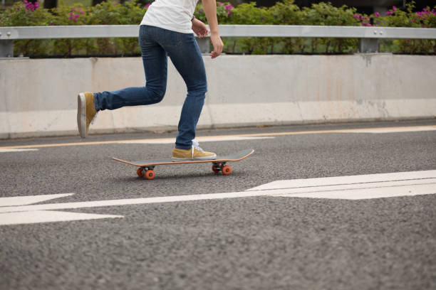 istock Skateboarder sakteboarding on highway 957164662