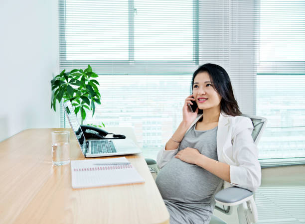 istock Pregnant woman talking on phone 957167728