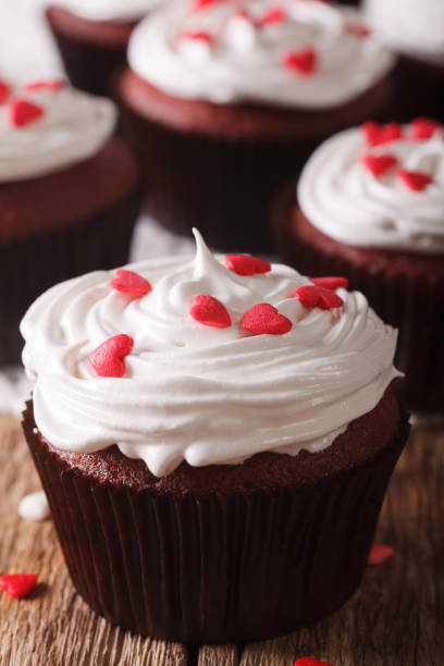 istock beautiful red velvet cupcakes on a table macro. vertical 957168780
