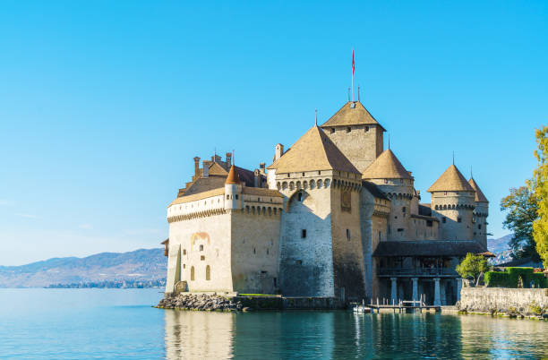 Chillon Castle on Lake Geneva Montreux, Switzerland - October 18, 2017: Chillon Castle on Lake Geneva in Alps mountains at autumn chateau de chillon stock pictures, royalty-free photos & images