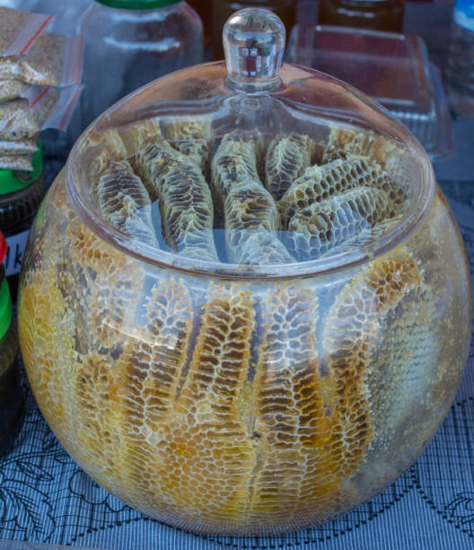 istock Fresh honey in the sealed comb frame 957173472