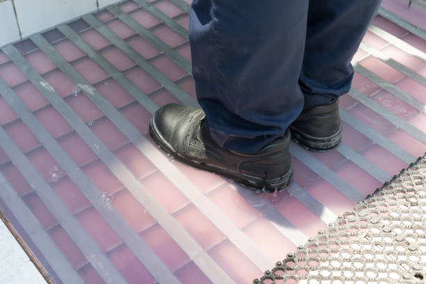 Closeup shot of a male feet dipped for disinfecting before enter factory. Protection Routines Hygienic\nProgram