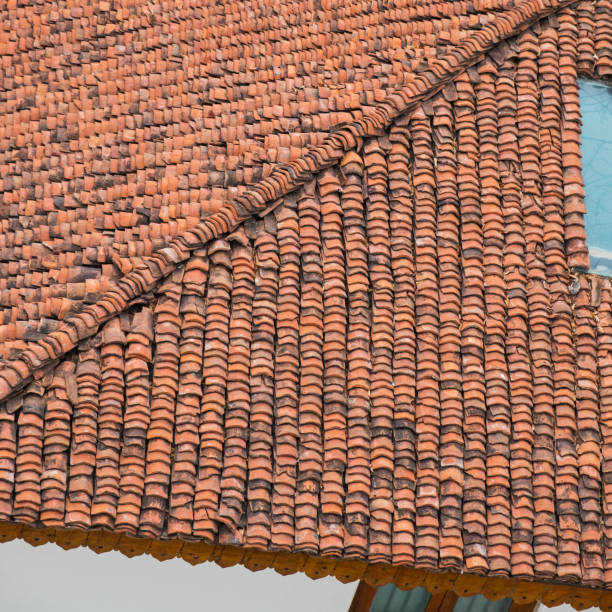 istock Pattern formed by clay roof tiles 957177266