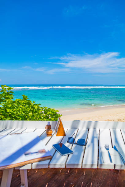 istock Tropical view at the ocean / sea from a coffee bar. 957177876