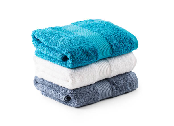 istock Stacked blue white and gray towels isolated on white 957178884