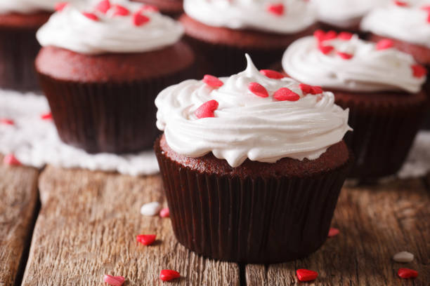 istock festive red velvet cupcakes decorated with hearts macro. horizontal 957183340