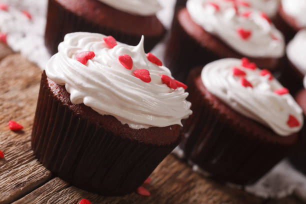 istock beautiful red velvet cupcakes on a table macro. Horizontal 957187274