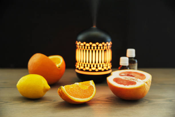 istock Still life of  fruits, essential oils and diffuser. 957190282