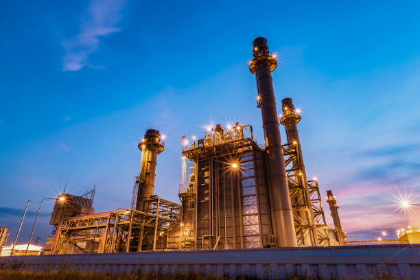 gas turbine electrical power plant at dusk with twilight support all factory in industrial estate - boiler power station gas boiler industrial boiler imagens e fotografias de stock