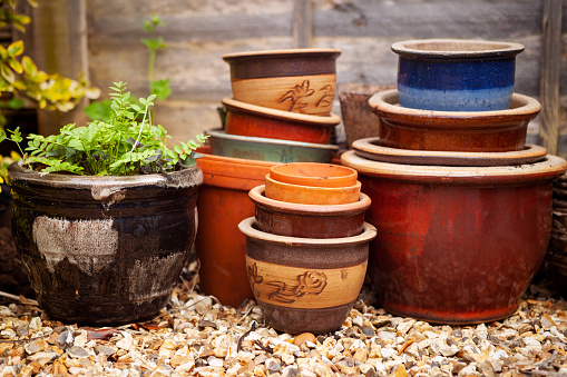 Empty garden pots ready for summer plants, vegetables, herbs or bedding.