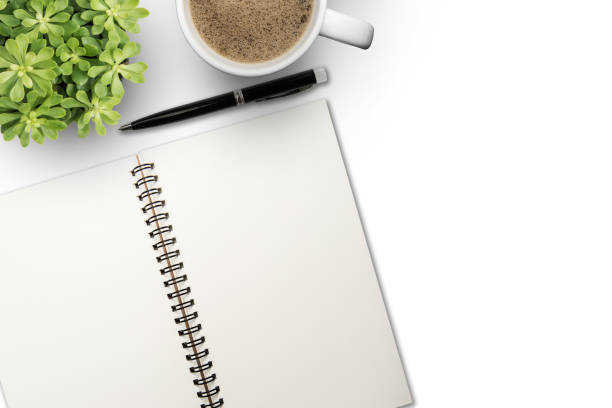 istock White office desk table with a lot of things on it. Top view 957206798