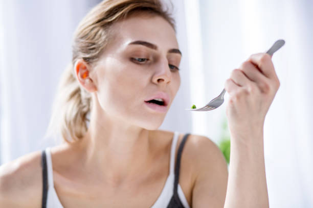 istock Unhappy young woman opening her mouth 957218346
