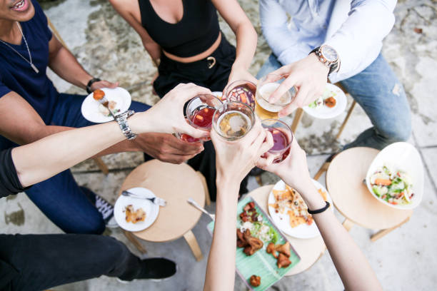 istock Friends meeting and party at rooftop 957223798