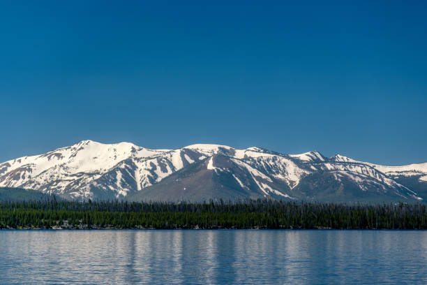 istock Yellowstone Lake with mountains landscape 957234510
