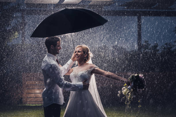 istock Even heavy rain can't ruin our love! 957238330
