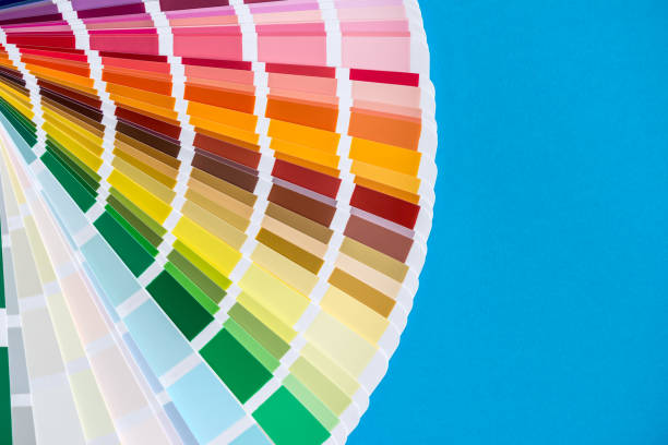 istock Colour sampler decomposed in fan, isolated on blue background 957239416