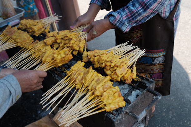 istock Pork fillet satay on a charcoal stove 957244176