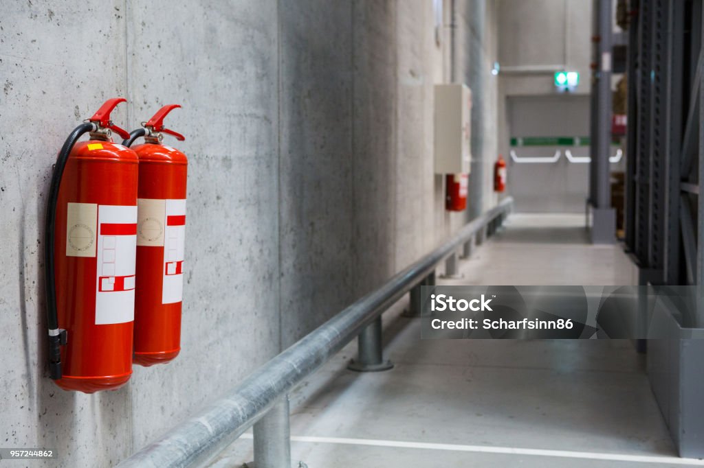 Fire extinguishers in the warehouse. Fire extinguishers in the warehouse. Fire safety Fire Extinguisher Stock Photo