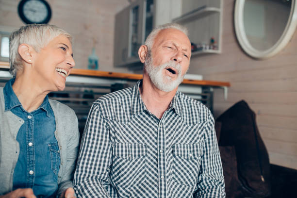 istock Mature couple at living room 957256294