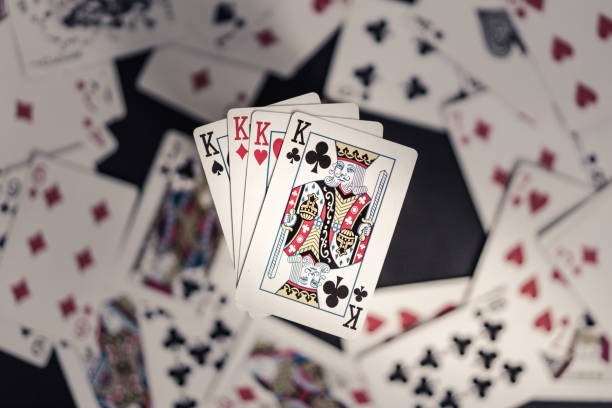 istock Four kings on top of old playing card 957261166