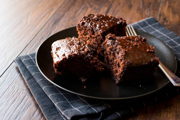 istock Moist Chocolate Sponge Cake Brownie Pieces in Black Plate 957270432