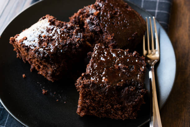 istock Moist Chocolate Sponge Cake Brownie Pieces in Black Plate 957271692