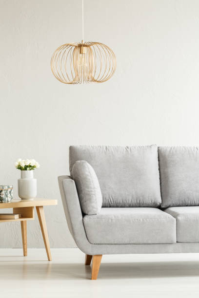 istock Grey and gold living room 957272208